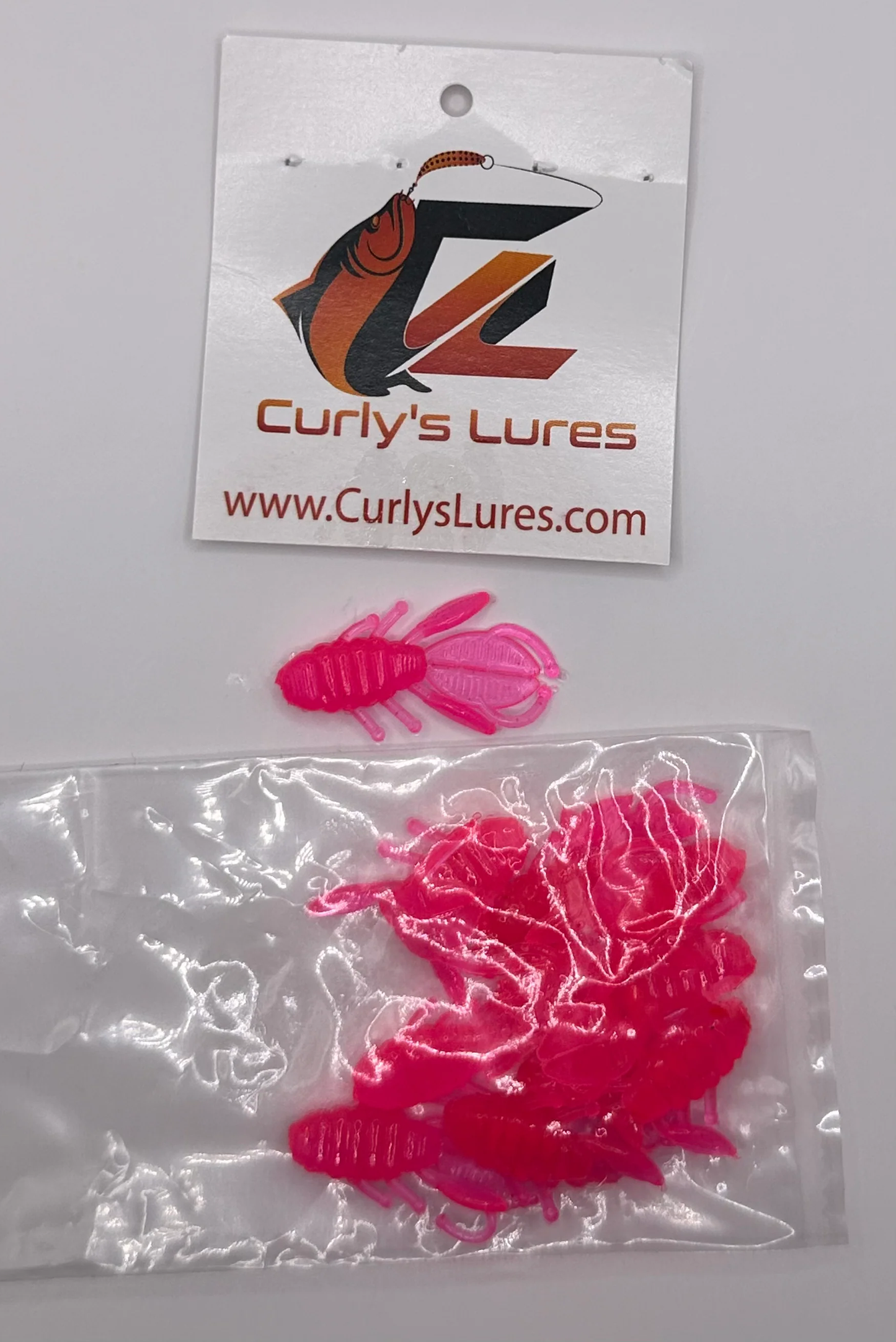 1.25” pink curly creature